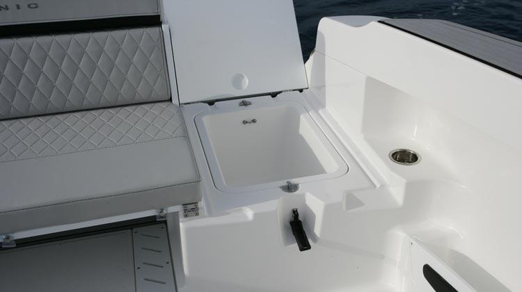 Stern, under seat wells(2) removable for extra storage and access to bilge 